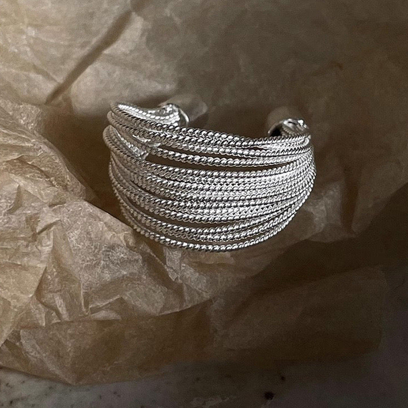 Pinch silk silver ring
